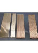 A 6.6ft tall gold Wedding Backdrop Shelf Stand is shown on a dark background, featuring two flat plates with holes, two rows of parallel rods, and a cluster of washers or rings at the center.