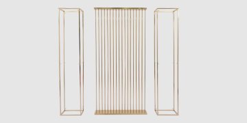 Three gold metal frames: two open rectangular prisms on either side of a central panel made of parallel vertical gold rods. The background is plain white.