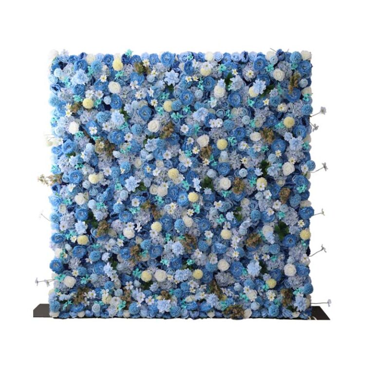A square flower wall display covered with densely packed artificial flowers in various shades of blue, white, and light green, set against a plain white background.