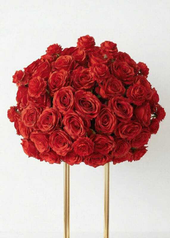 A luxurious 24in wedding flower ball centerpiece features elegant white rose hydrangeas with blush roses and orchids, beautifully arranged on a stand with two slender gold legs, set against a plain white background. Comes as a 2 pack.