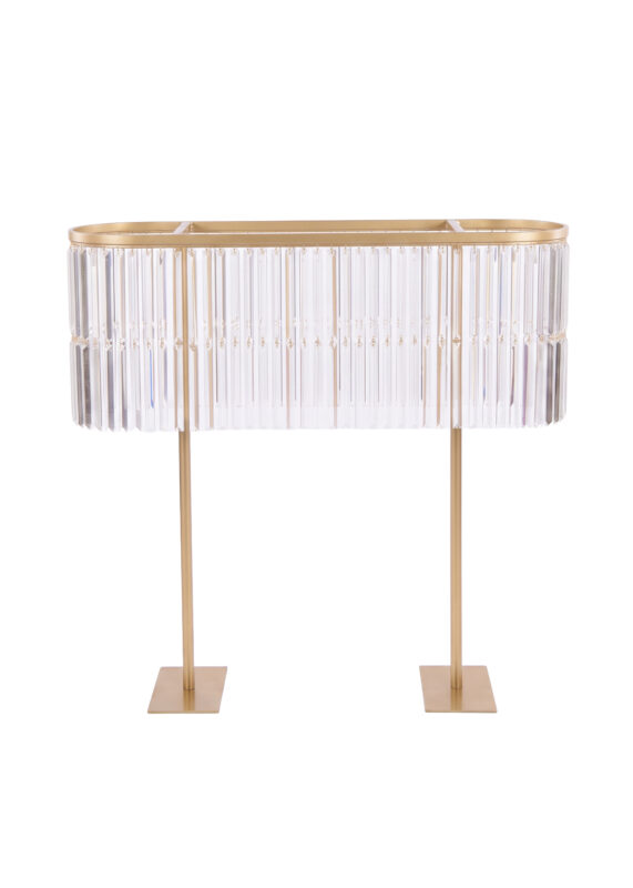 Oval-shaped console table with a gold frame and hanging clear glass panels, supported by two thin gold legs on square bases.